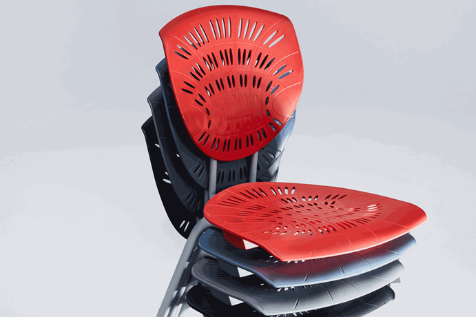 Stacked Bodyfurn Original chairs in multiple colours