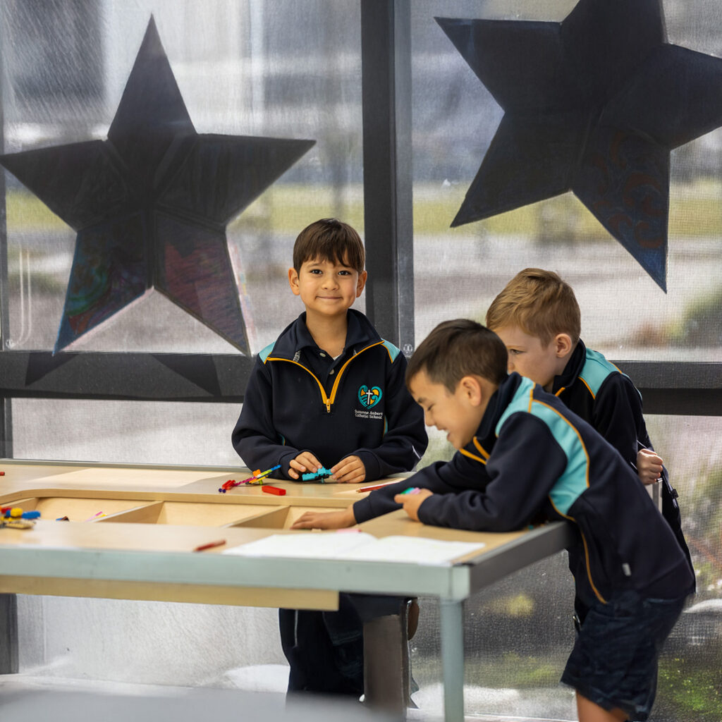 Tinker Table with Three Boys