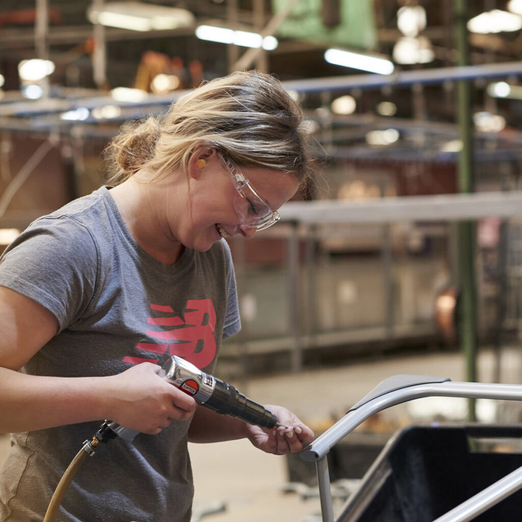 Furnware carpenter working in factory