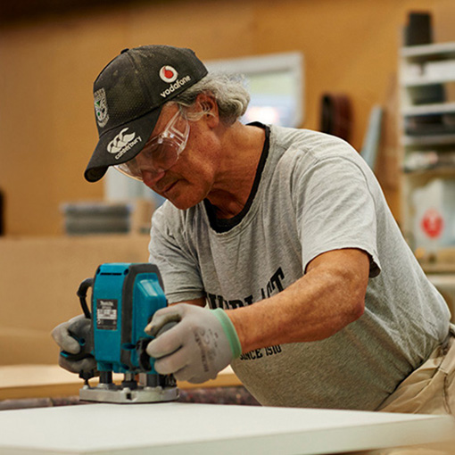 Furnware carpenter working in factory